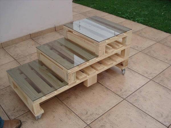 coffee table with glass top out of pallet wood.