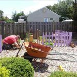 cleaning the area for pallet garden picket fence