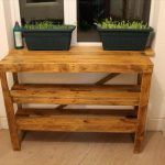 repurposed pallet potting table with shelves