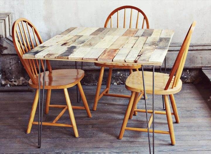 reconstructed pallet dining table with metal legs