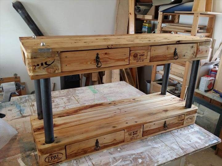 repurposed pallet and metal pipe TV stand