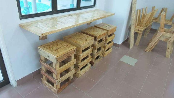 wooden pallet wall mounted desk with stools