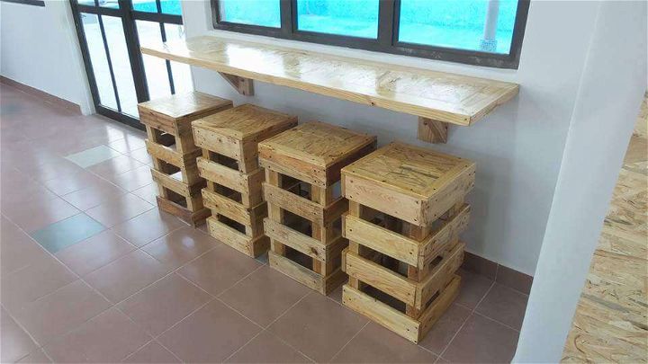 wooden pallet wall hanging desk with stools