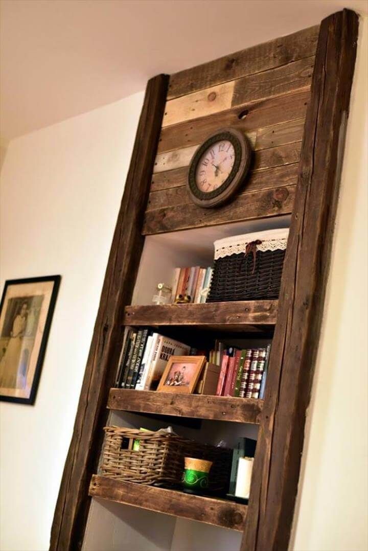 Repurposed pallet faux fireplace inspired shelves