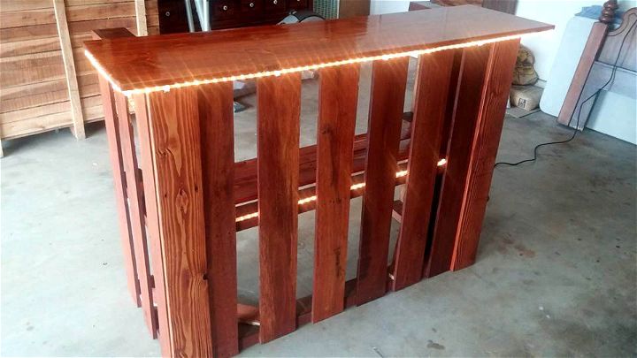 recycled wooden pallet bar with lights