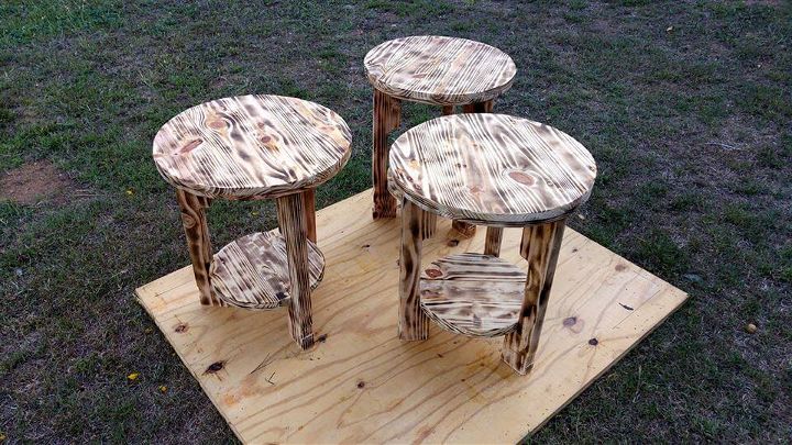 antique wooden pallet scorched round tables