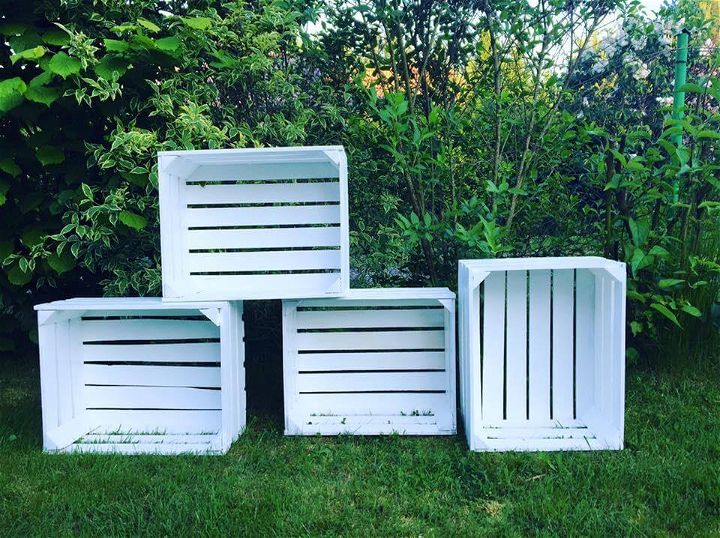 White stained pallet storage crates