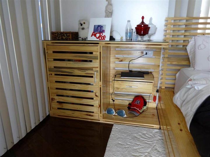 pallet-made nightstand with mobile charging station and storage cabinet
